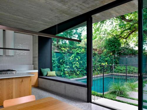 Single-family villa design: open kitchen, swimming pool in backyard, most beautiful summer garden
