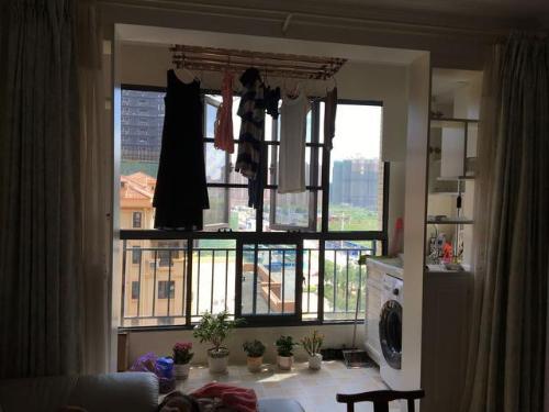 Is it wrong to dry a new apartment in a move, and hang clothes on balcony?
